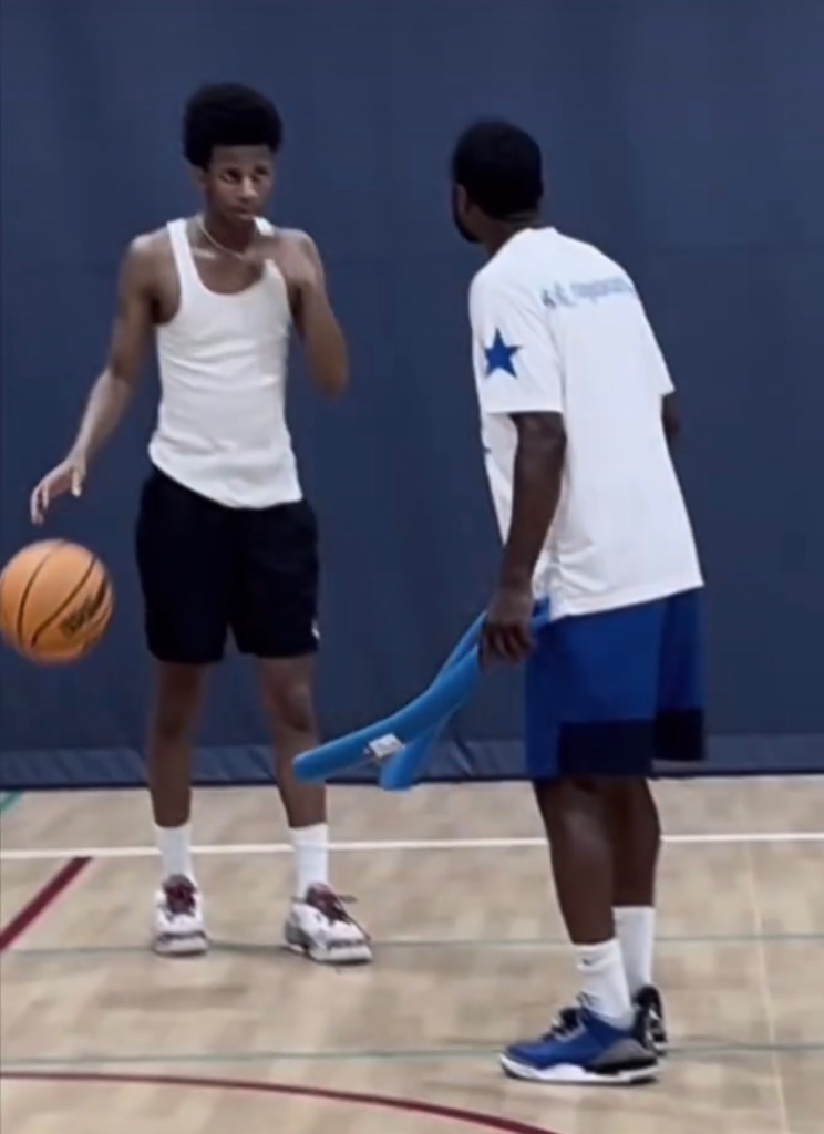 Coach J training a player - Rising Starz Athletes