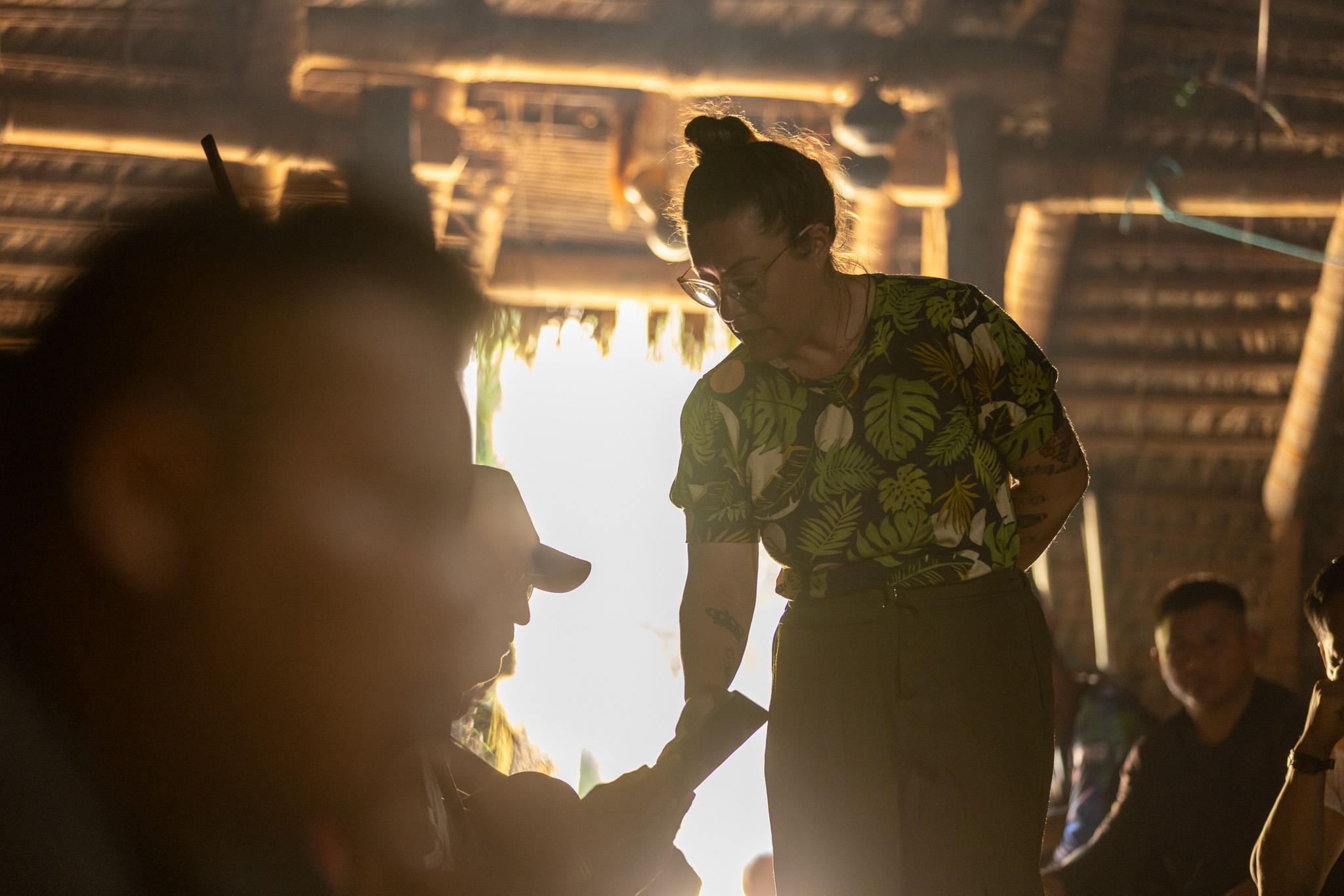 In the maloca, the meeting precedes the technology — the community speaks before the network listens.