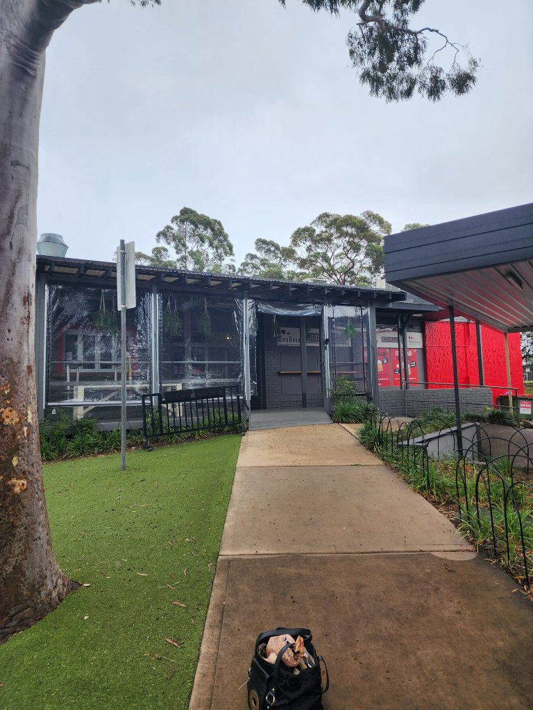 Shop front before rebrand — no signage, invisible to passers-by