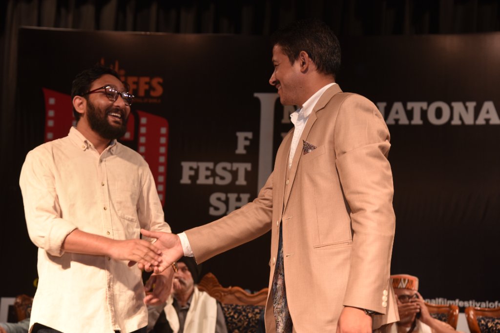 Traditional scarf presentation — IFFS Shimla