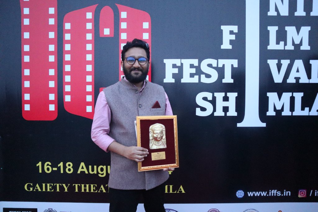 Posing with the award — IFFS Shimla
