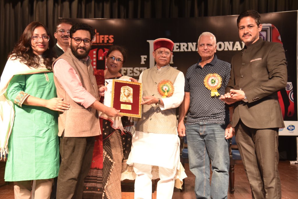Award plaque presentation — International Film Festival