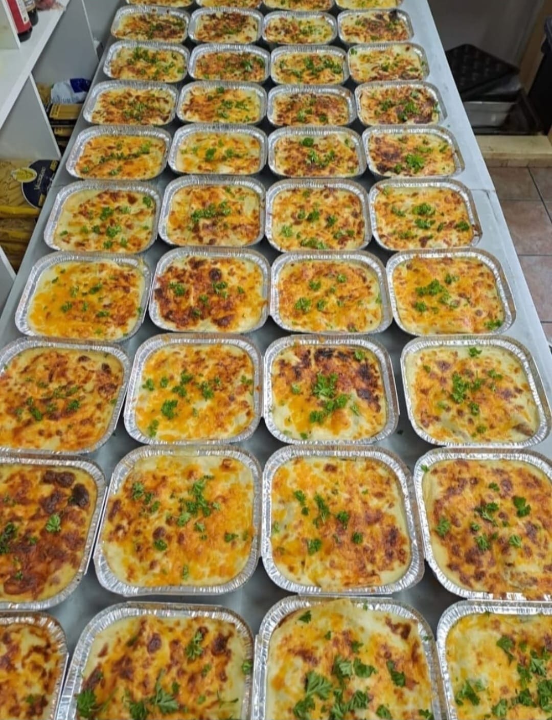 BEEF LASAGNE (OUR CHEESY FAMILY CROWD PLEASER) served with an Italian salad
