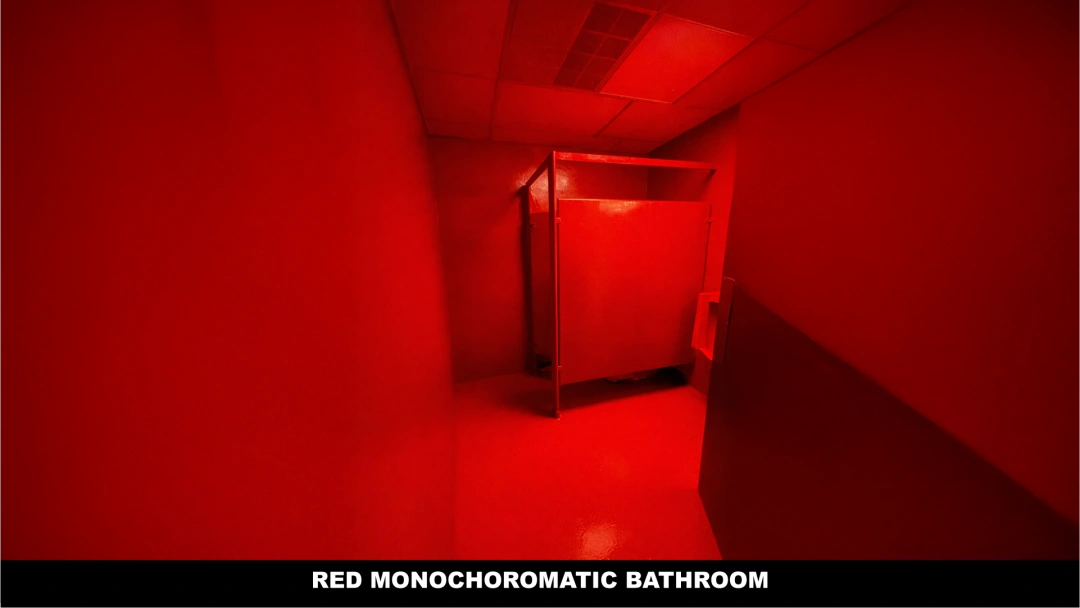 Red Monochromatic Bathroom Stall