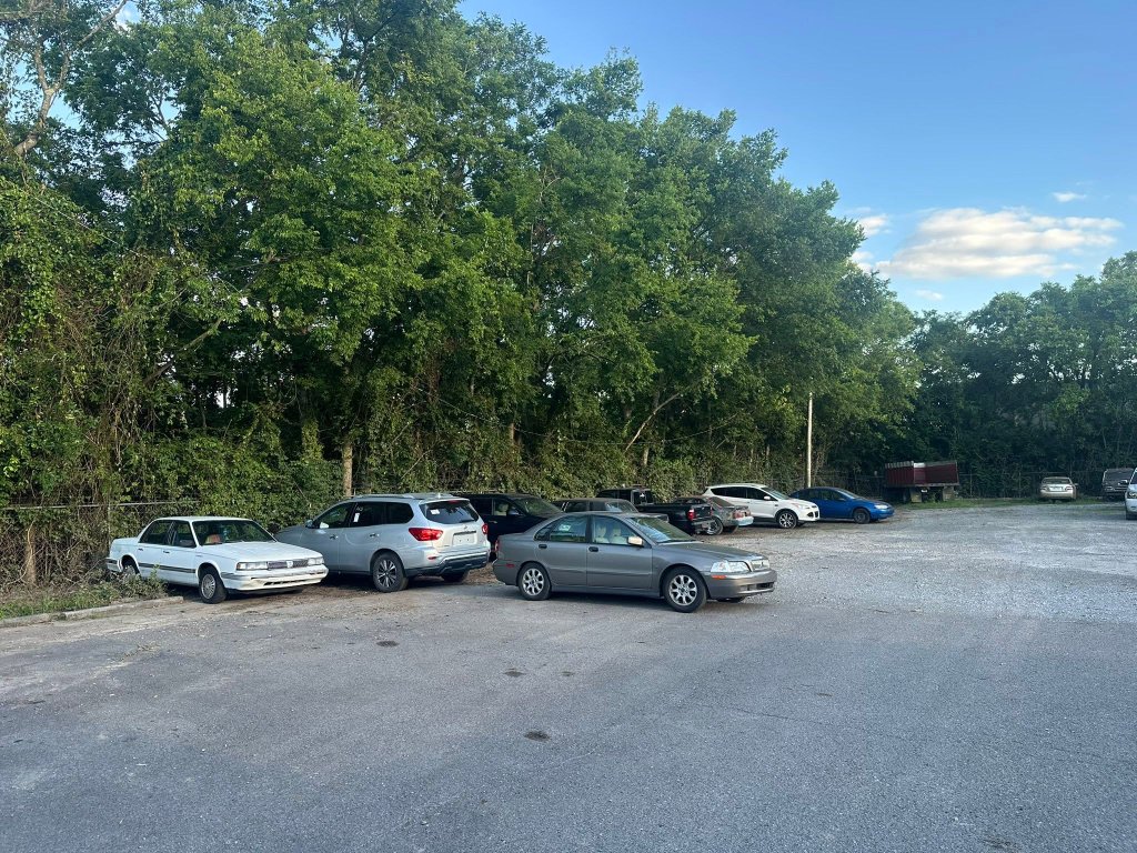 Clean commercial fence line cleared of brush and invasive growth after Back 40 Land Services forestry mulching in Nashville, Davidson County TN