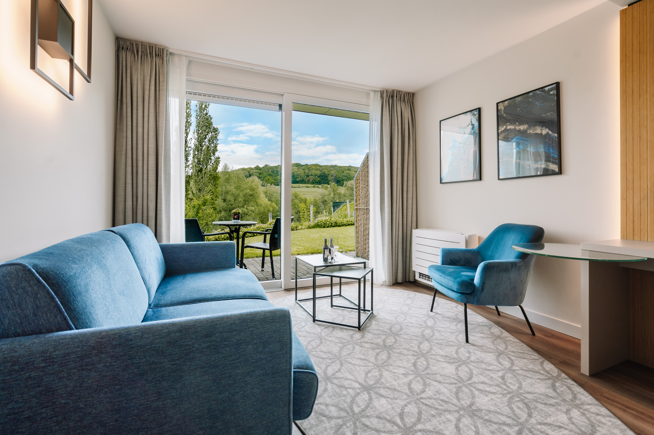 Zithoek in Junior Suite met terras en uitzicht, De Zevende Heerlijkheid