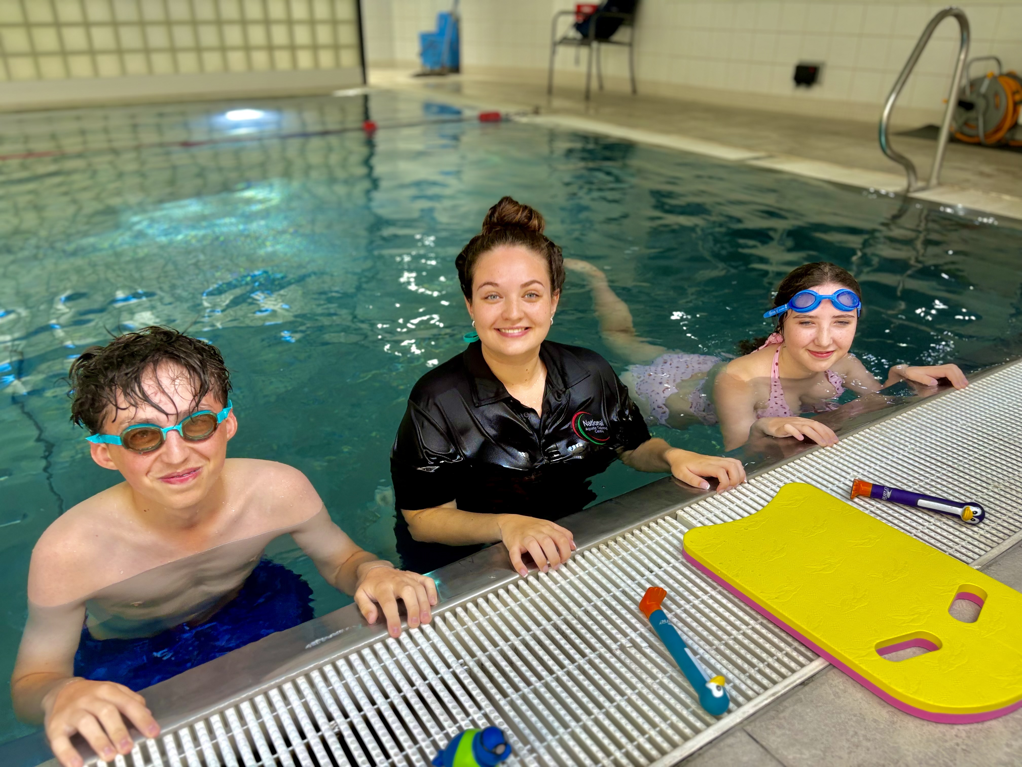 NATC instructor with two students