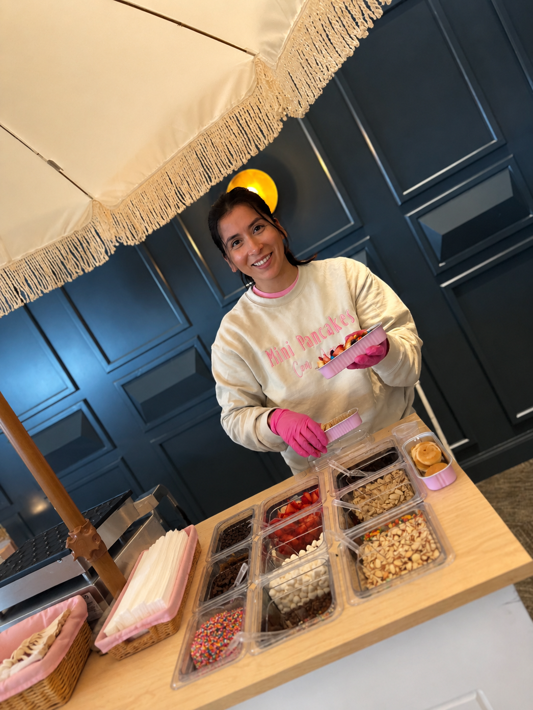 Pouring mini pancakes with care and precision