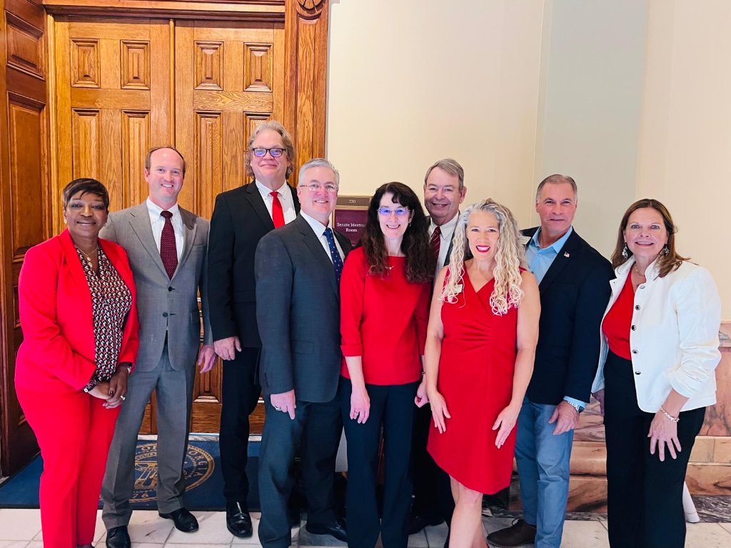 Dr. Orabueze with colleagues at the Georgia Senate Meeting Room