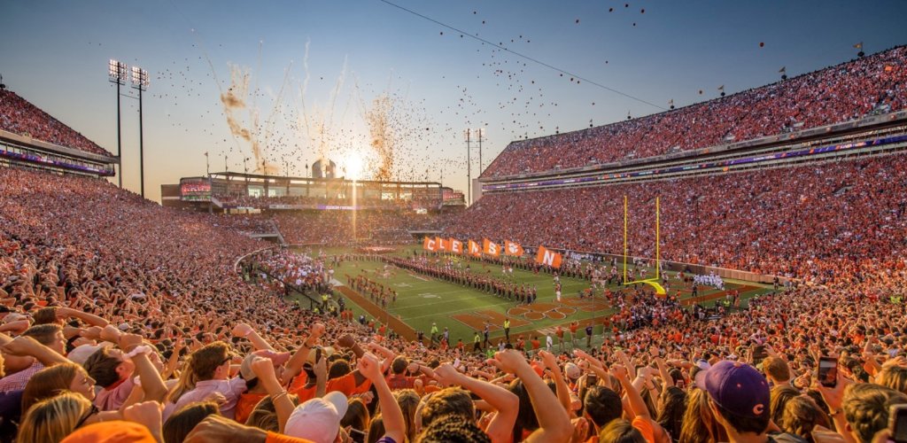 Memorial Stadium packed with 80,000 Clemson fans at sunset