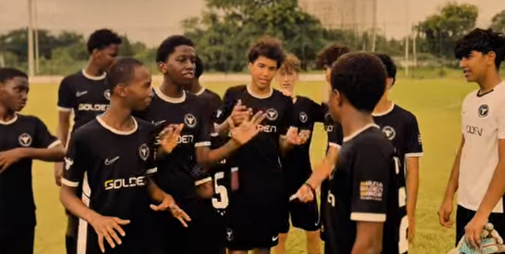 Team players in huddle