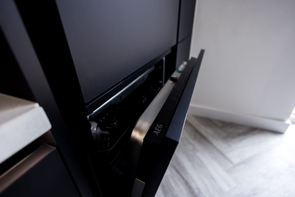 Precision installation — AEG integrated appliances — CJ Marra workshop, Wiltshire