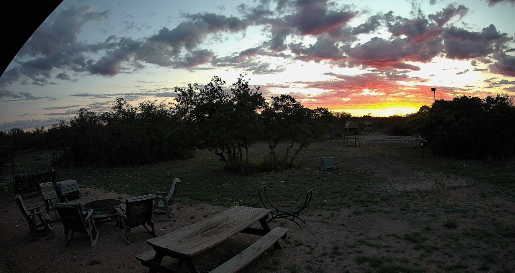 El Chital Ranch luxury hunting lodge interior with warm fireplace lighting