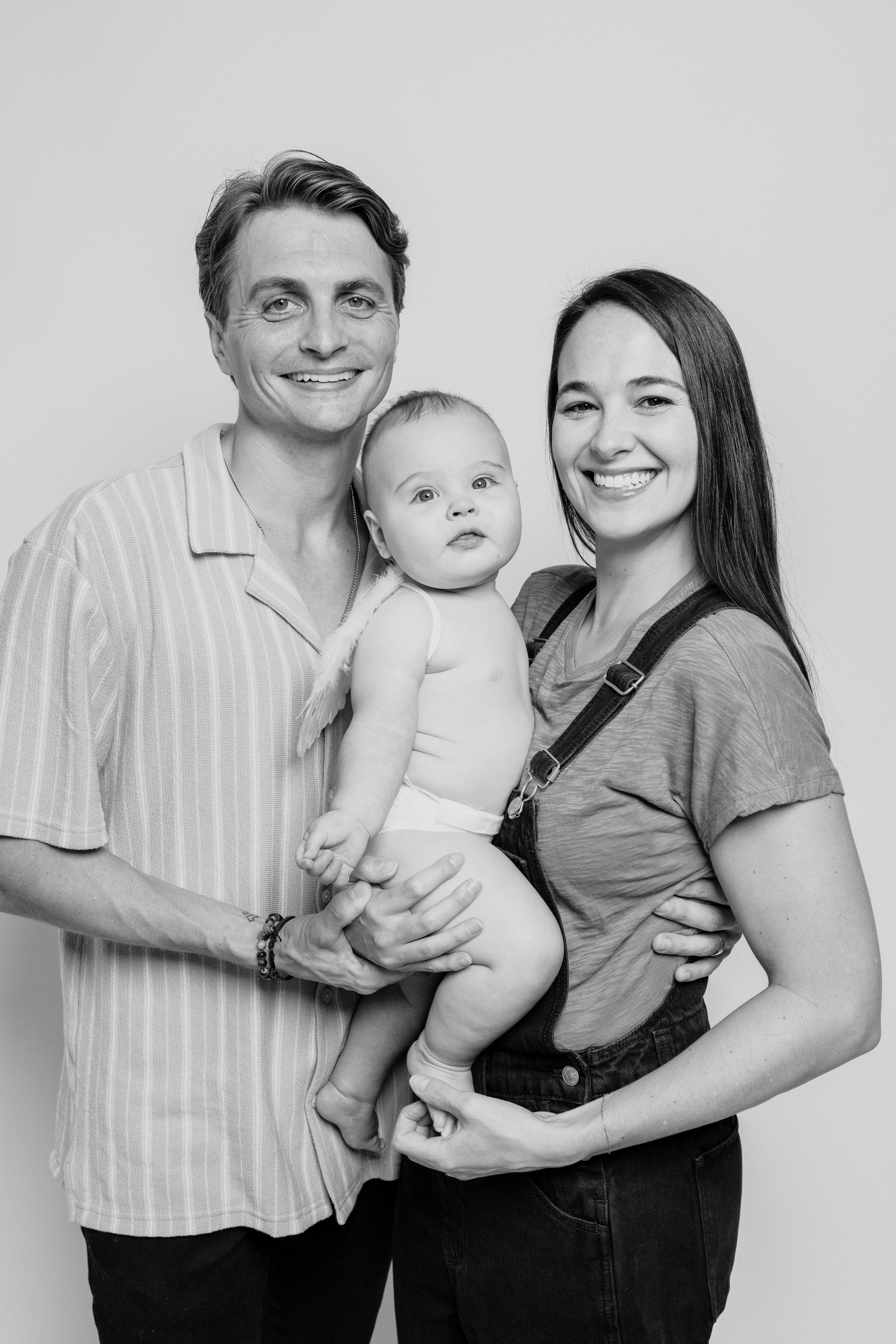 Alex, Nick, and their son