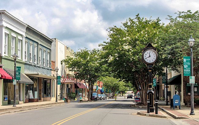 Historic downtown York with charming storefronts and tree-lined streets