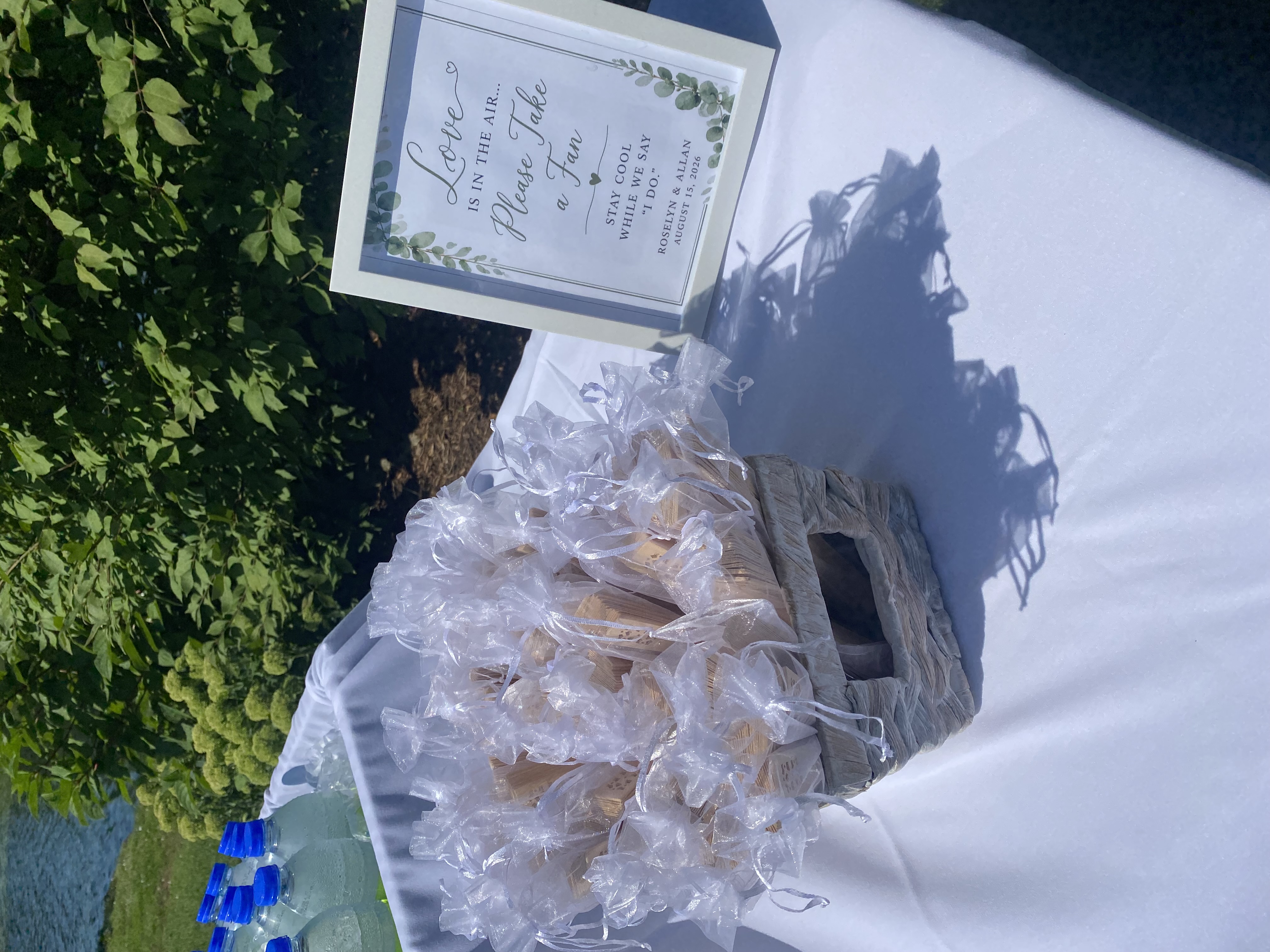 Favour table with Love is in the Air sign for Roselyn & Allan