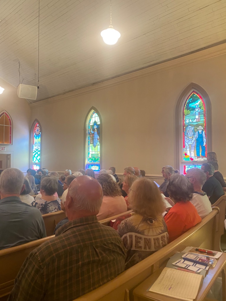 Sanctuary with stained glass windows
