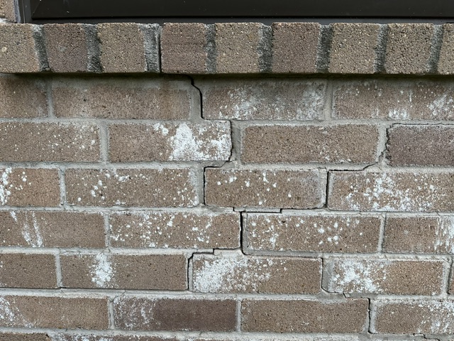 Stair-step foundation crack documented during a home inspection