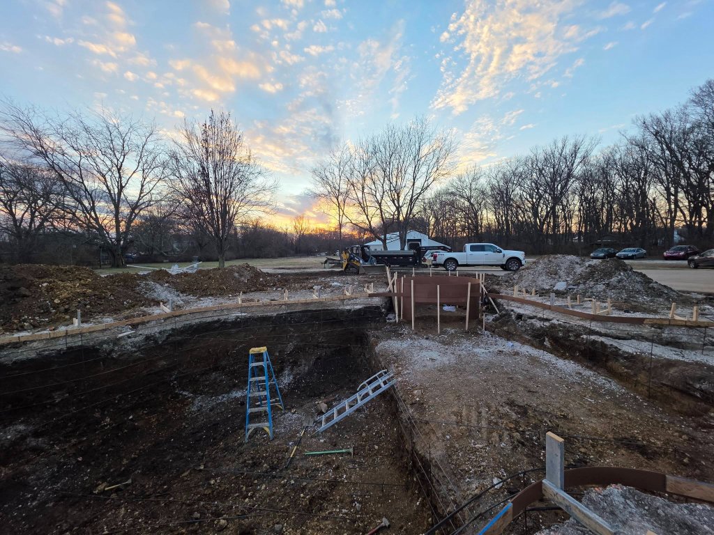 Hops Hauling excavation job at sunset