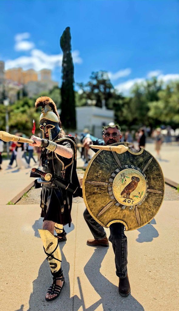 Posing with a Greek warrior and shield