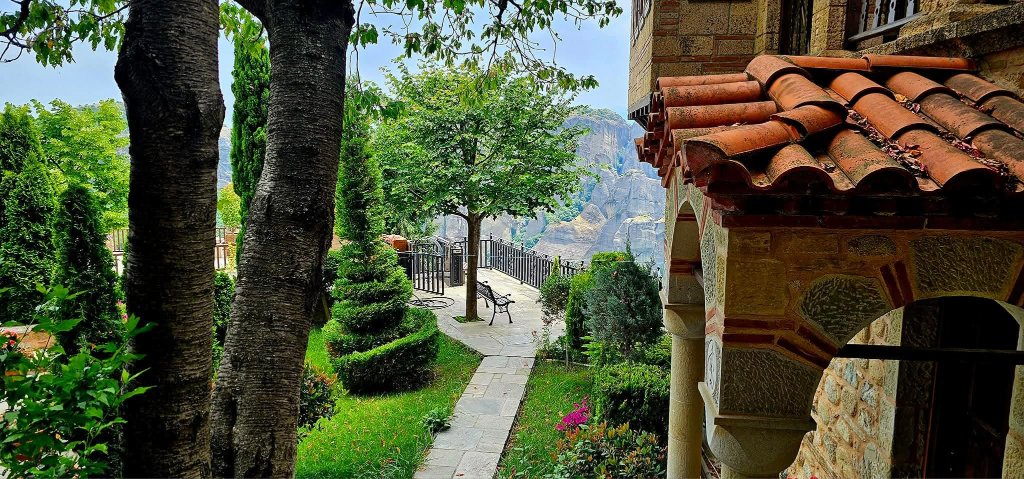 Meteora Monastery garden and chapel courtyard