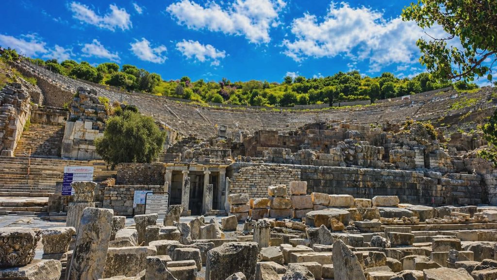 Group worship moment at the ancient ruins