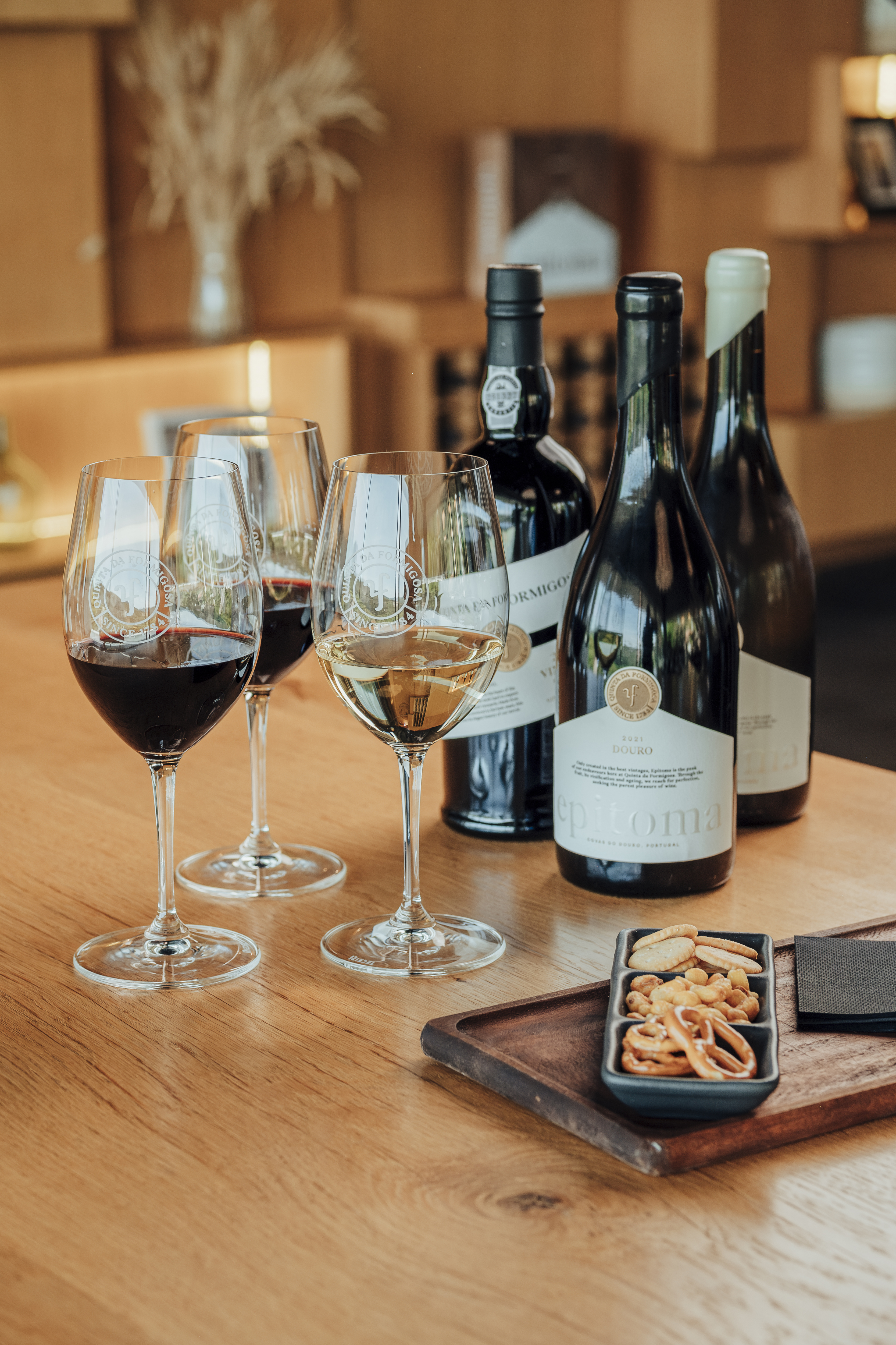 Wine tasting arrangement on wooden table