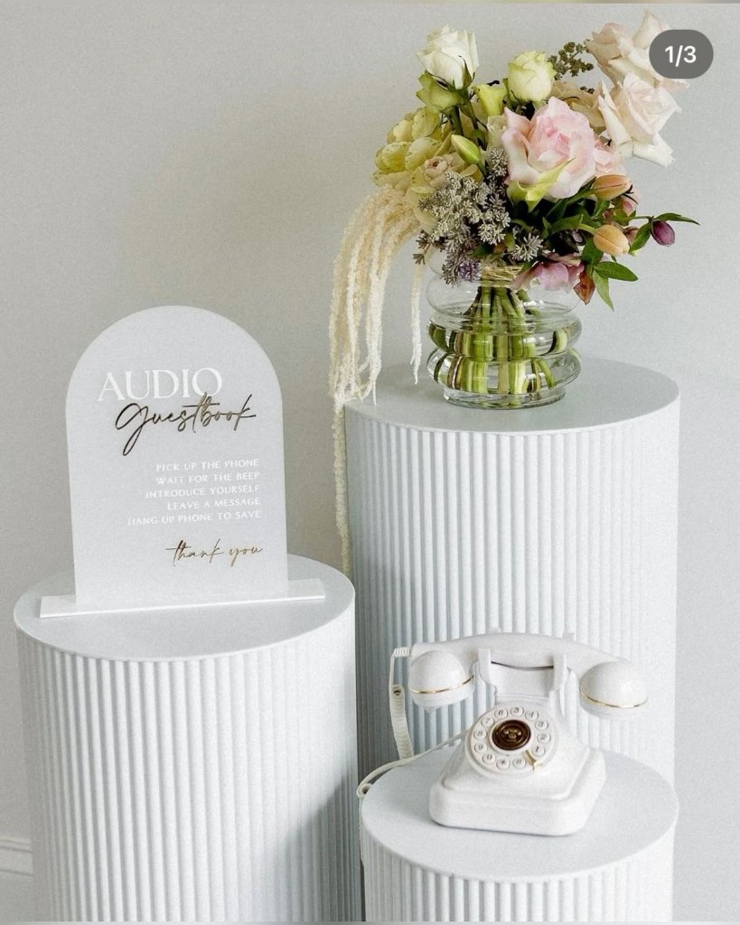 Minimal white guestbook station