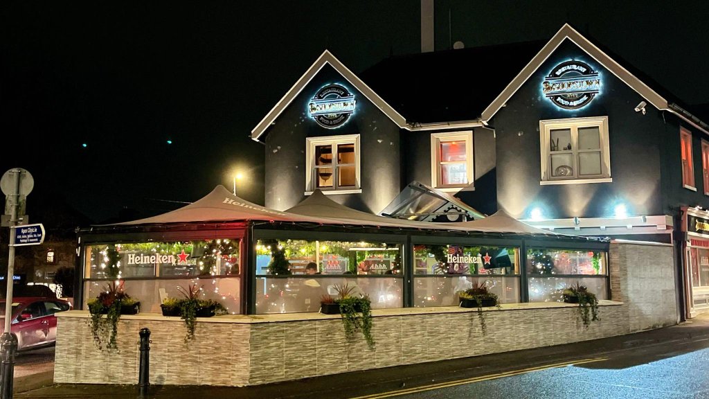 The Bishopstown Bar exterior at night