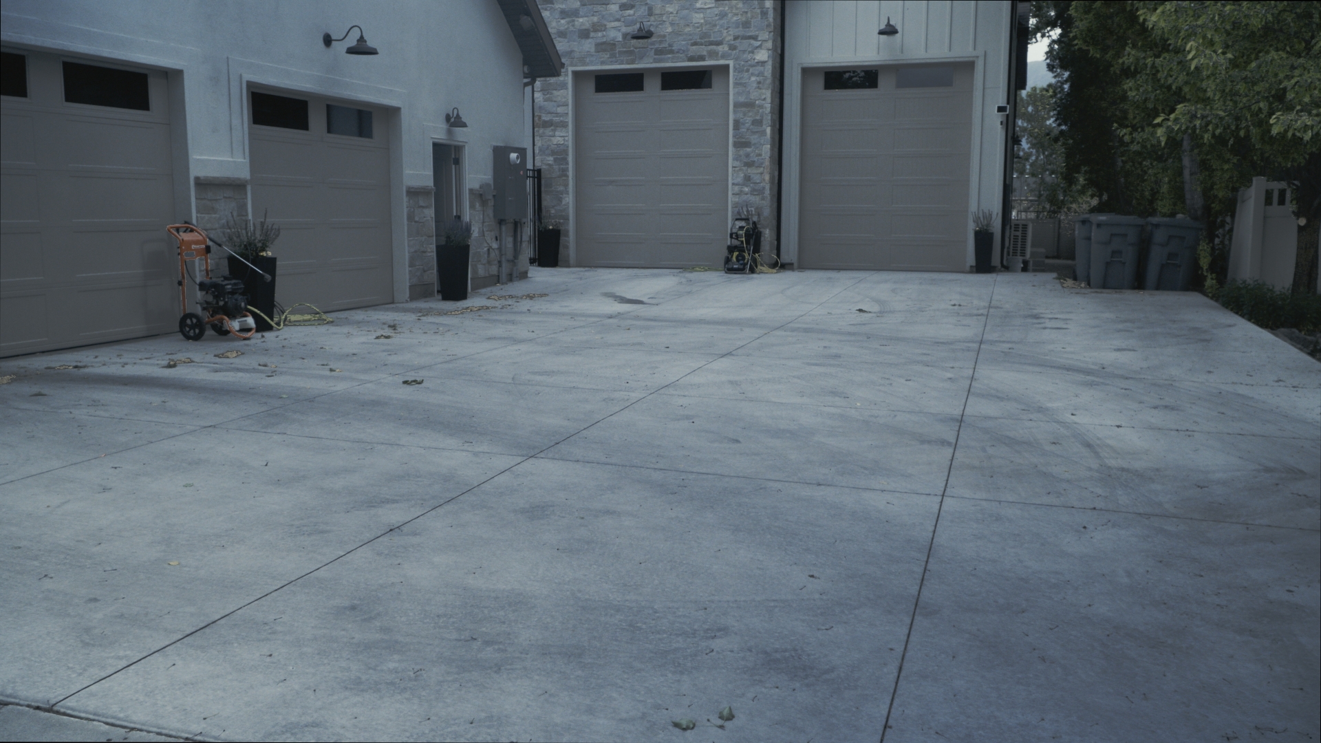 Dirty driveway before cleaning