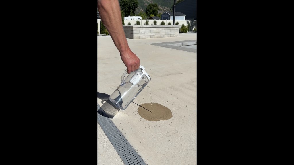 Water absorbing into unsealed concrete before sealing