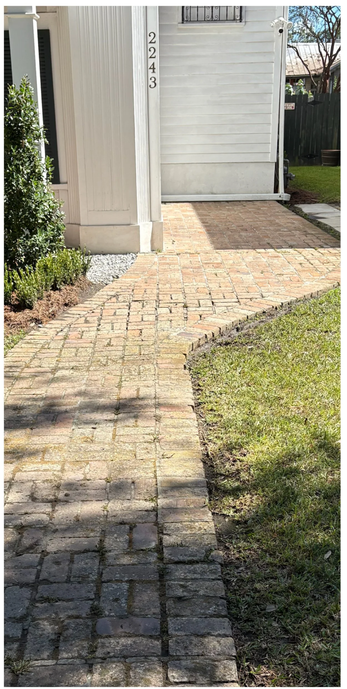 Clean bright brick paver walkway after cleaning