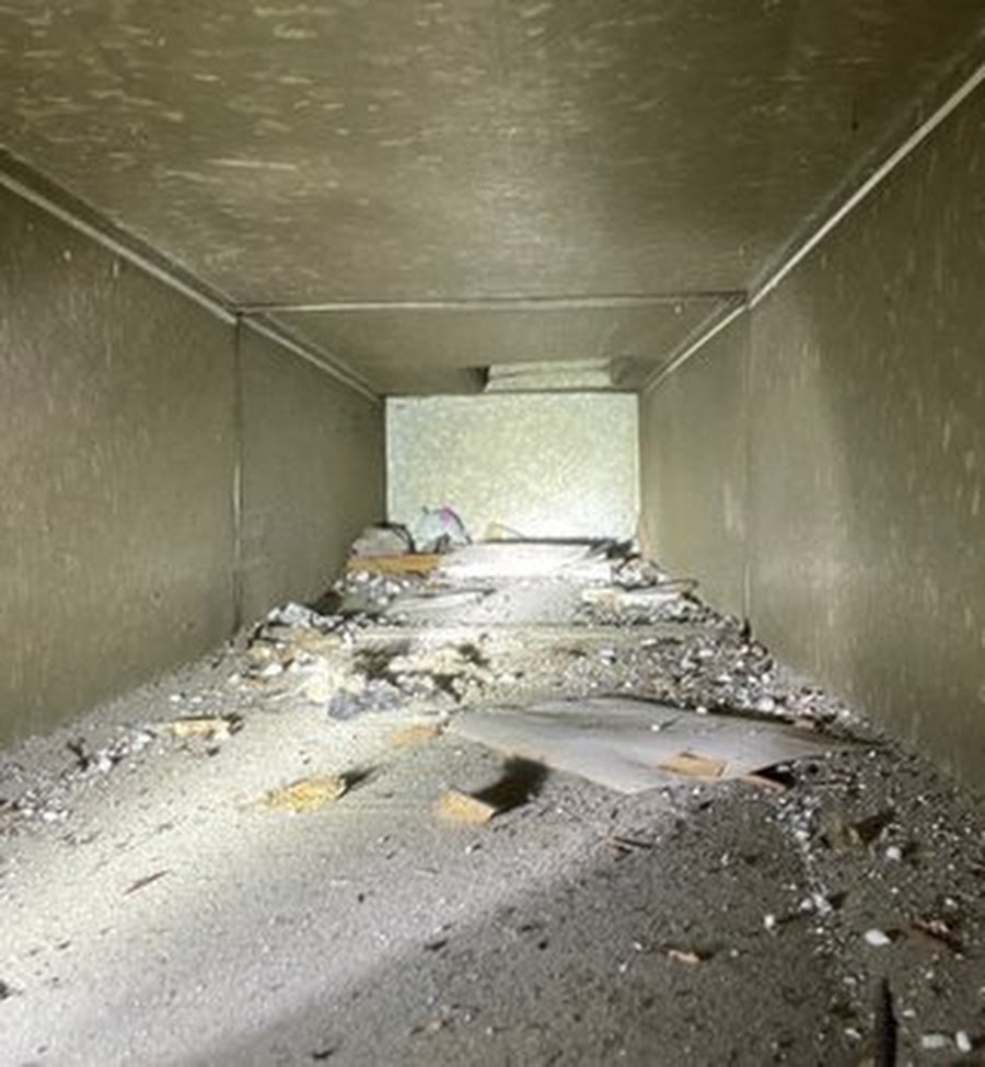 Dirty air vent register — heavy dust accumulation before cleaning