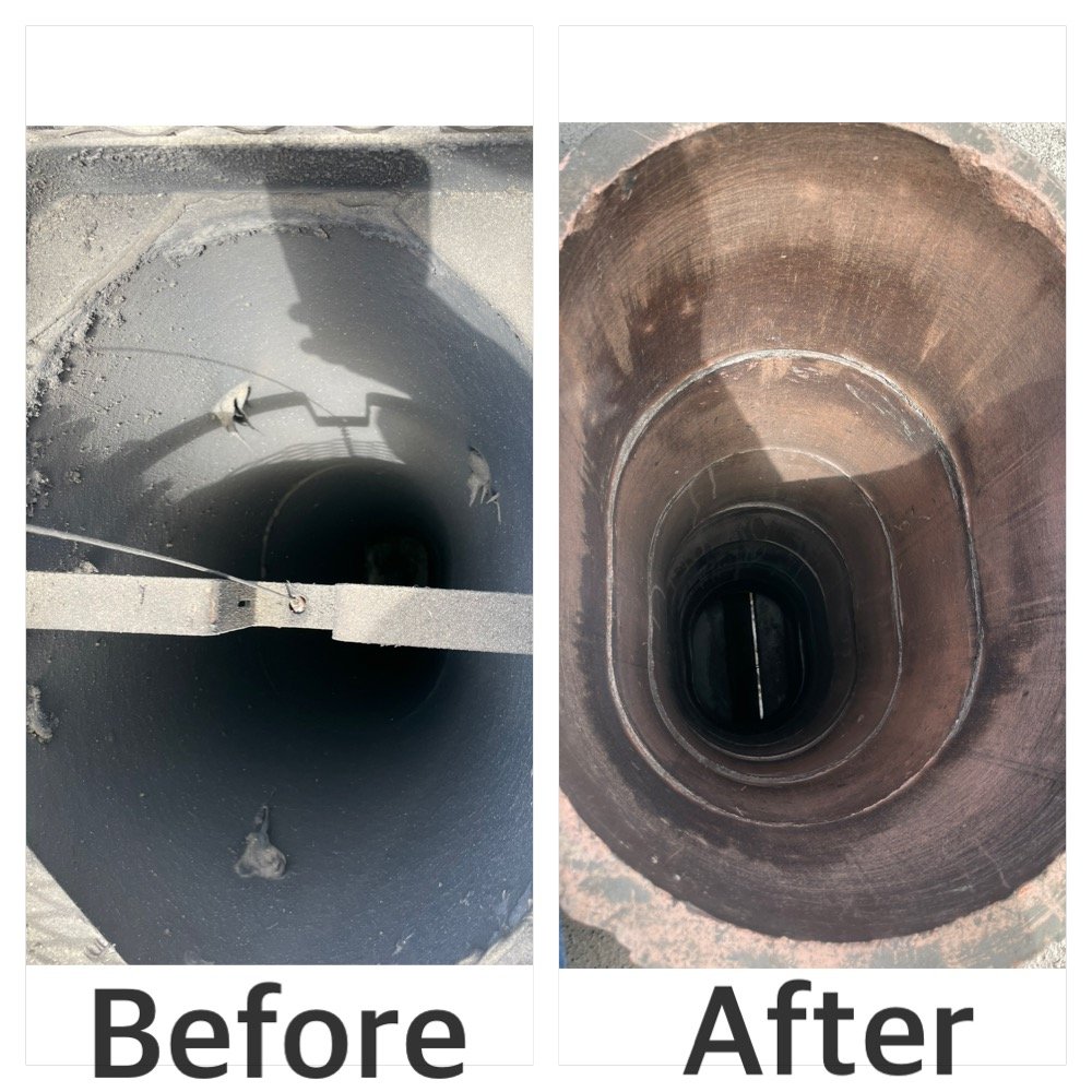 Chimney flue oval opening — inspection showing buildup