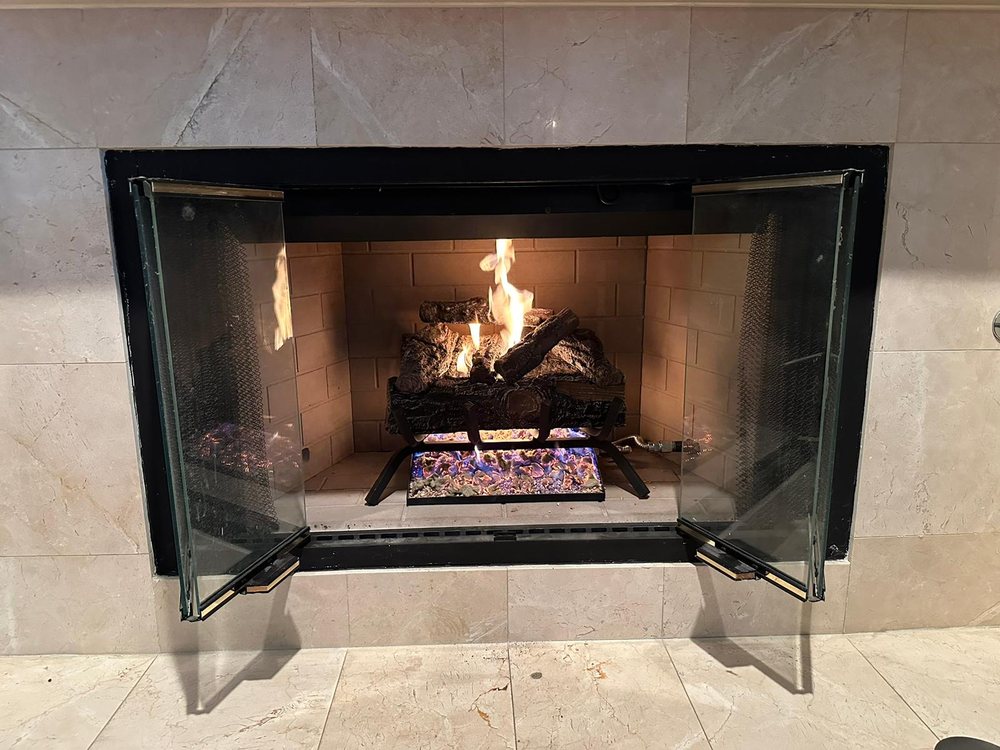 New stainless steel chimney liner installed — relining complete