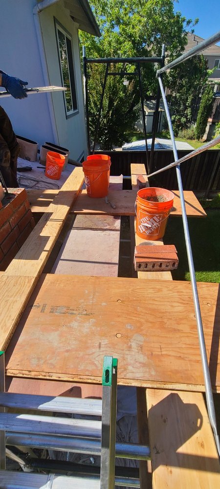 Scaffolding setup for chimney rebuild project