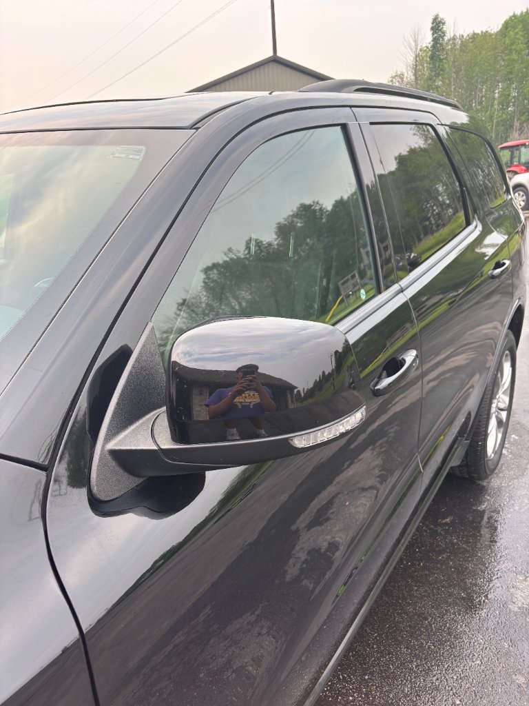 SUV mirror with deep gloss finish after paint correction