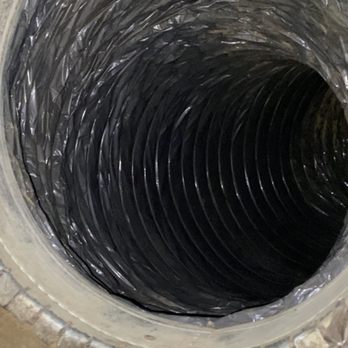 Flex duct interior - dark buildup before service