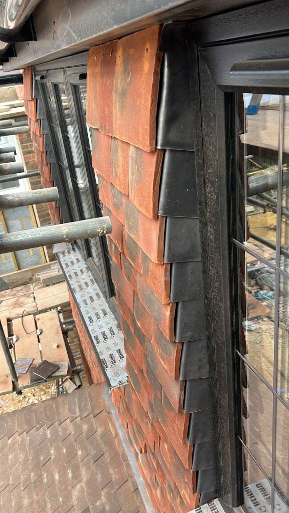 Tile roofing installation and repair by Bumblebee Roofing team