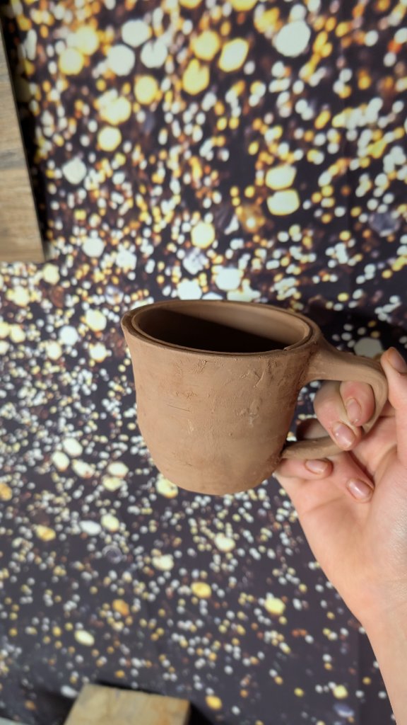 Clay mug with handle