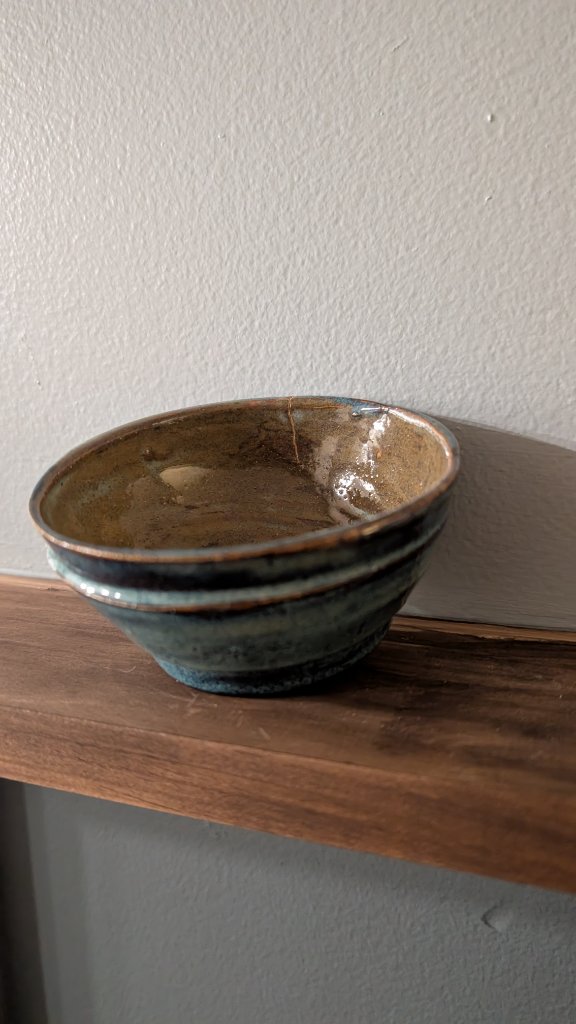 Teal and brown glazed bowl