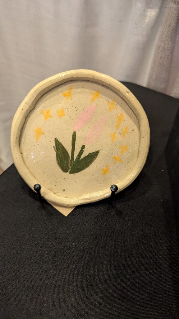 Painted ceramic plate with botanical design