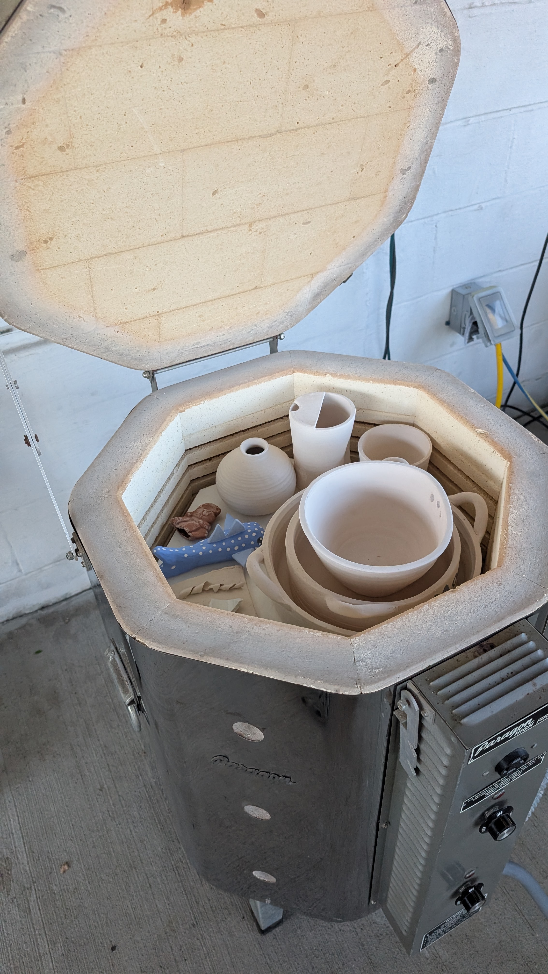 Paragon kiln loaded with unglazed pottery