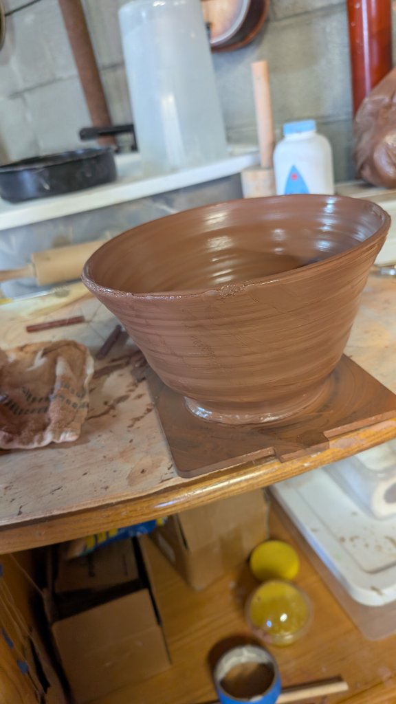 Large bowl freshly thrown on wheel