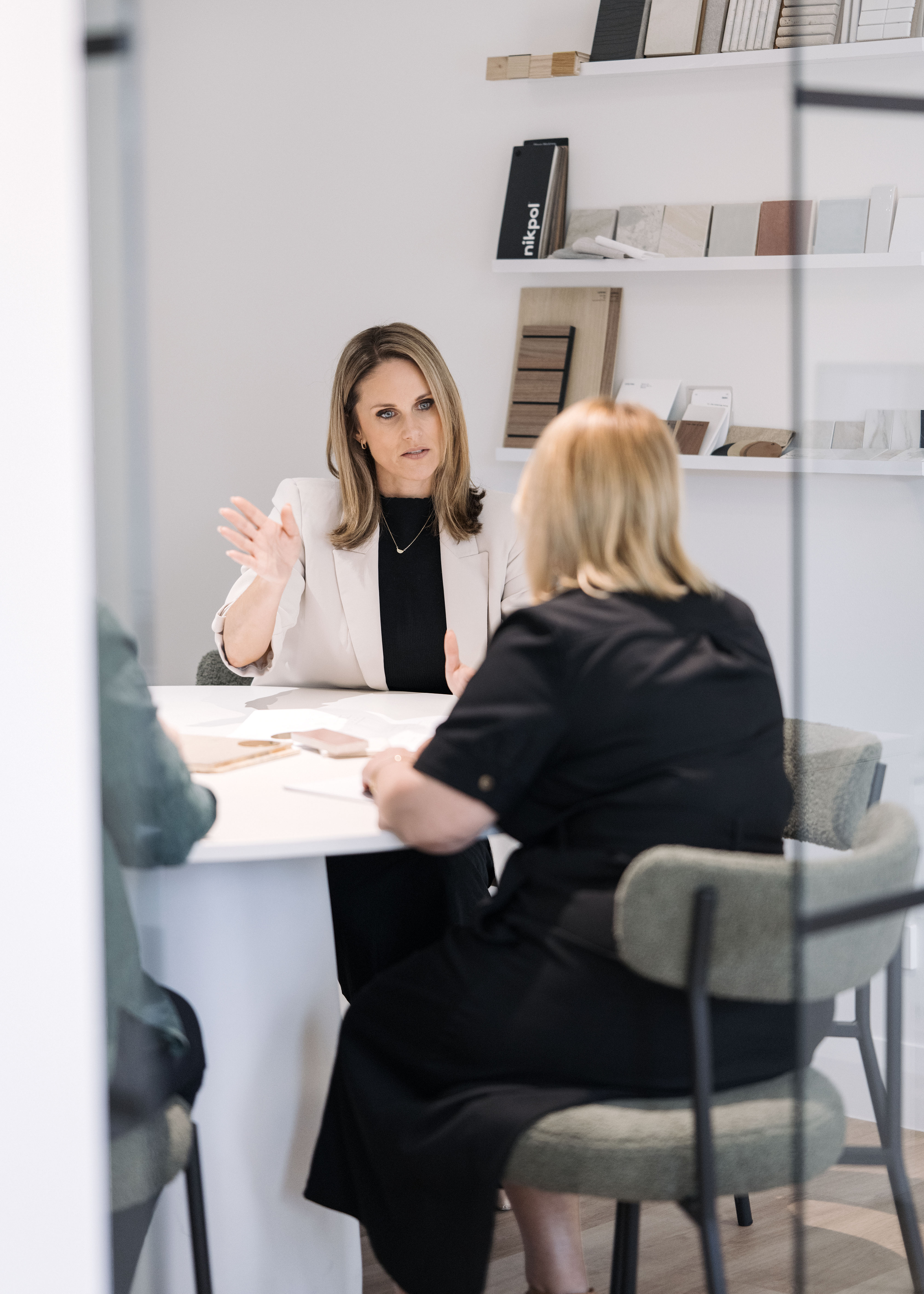 Vicky Cutler in conversation with clients at the studio