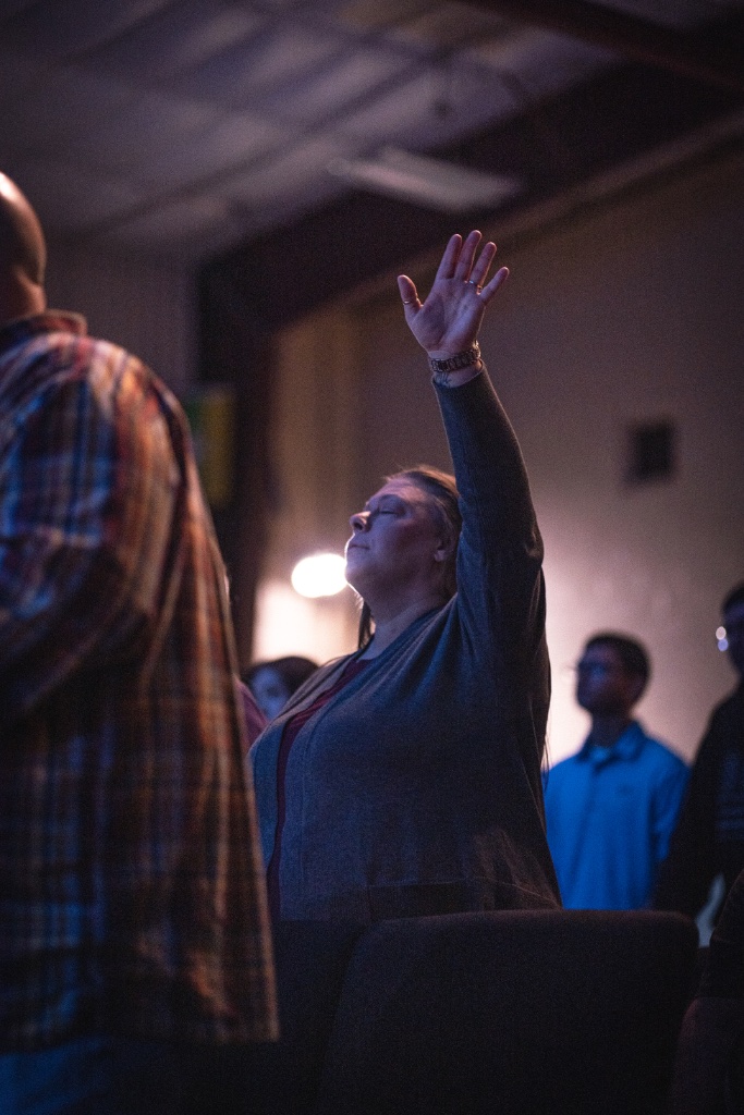 Worship hands raised