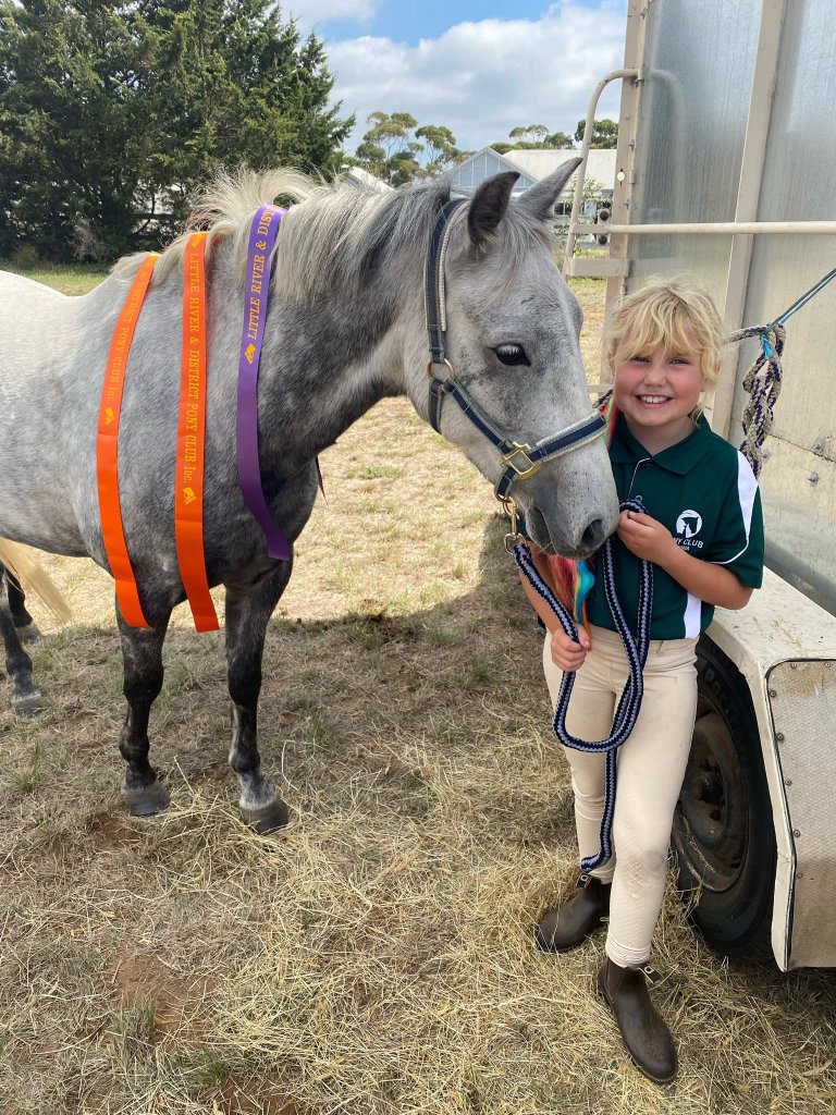 A young member with her prize-winning pony