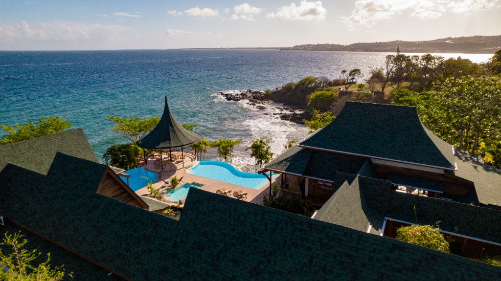 Aerial view — pool, gazebo & Caribbean coast