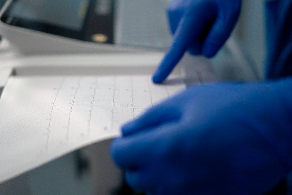 Medical professional reviewing test results