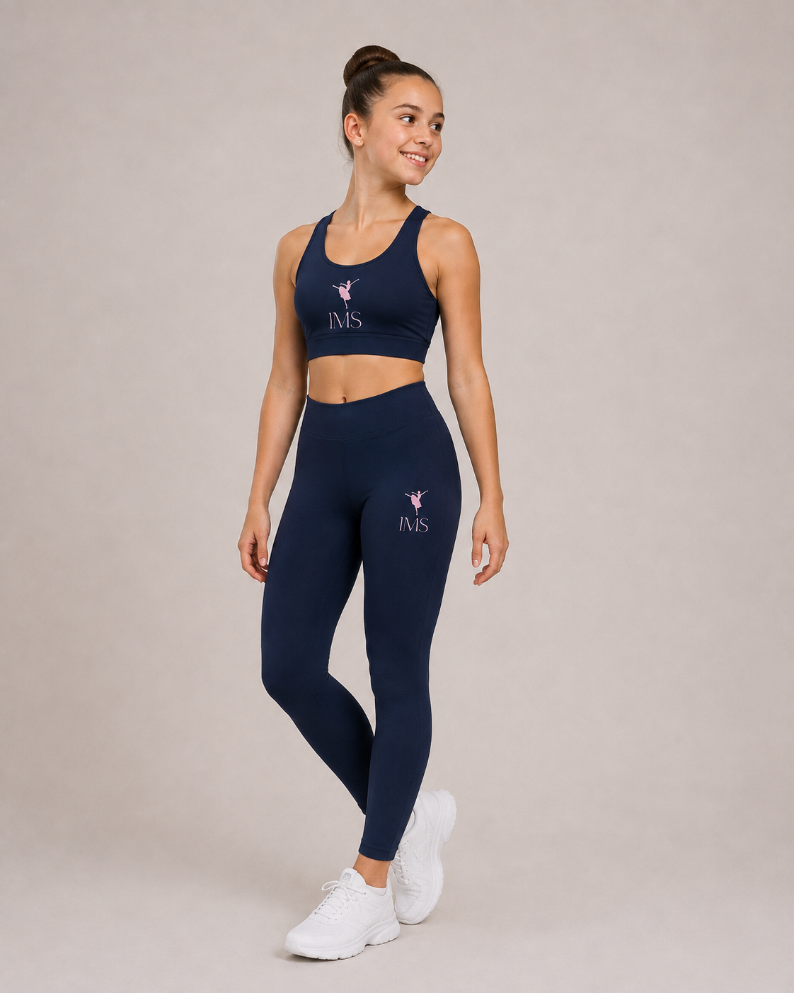 Navy sports bra and high-waisted leggings